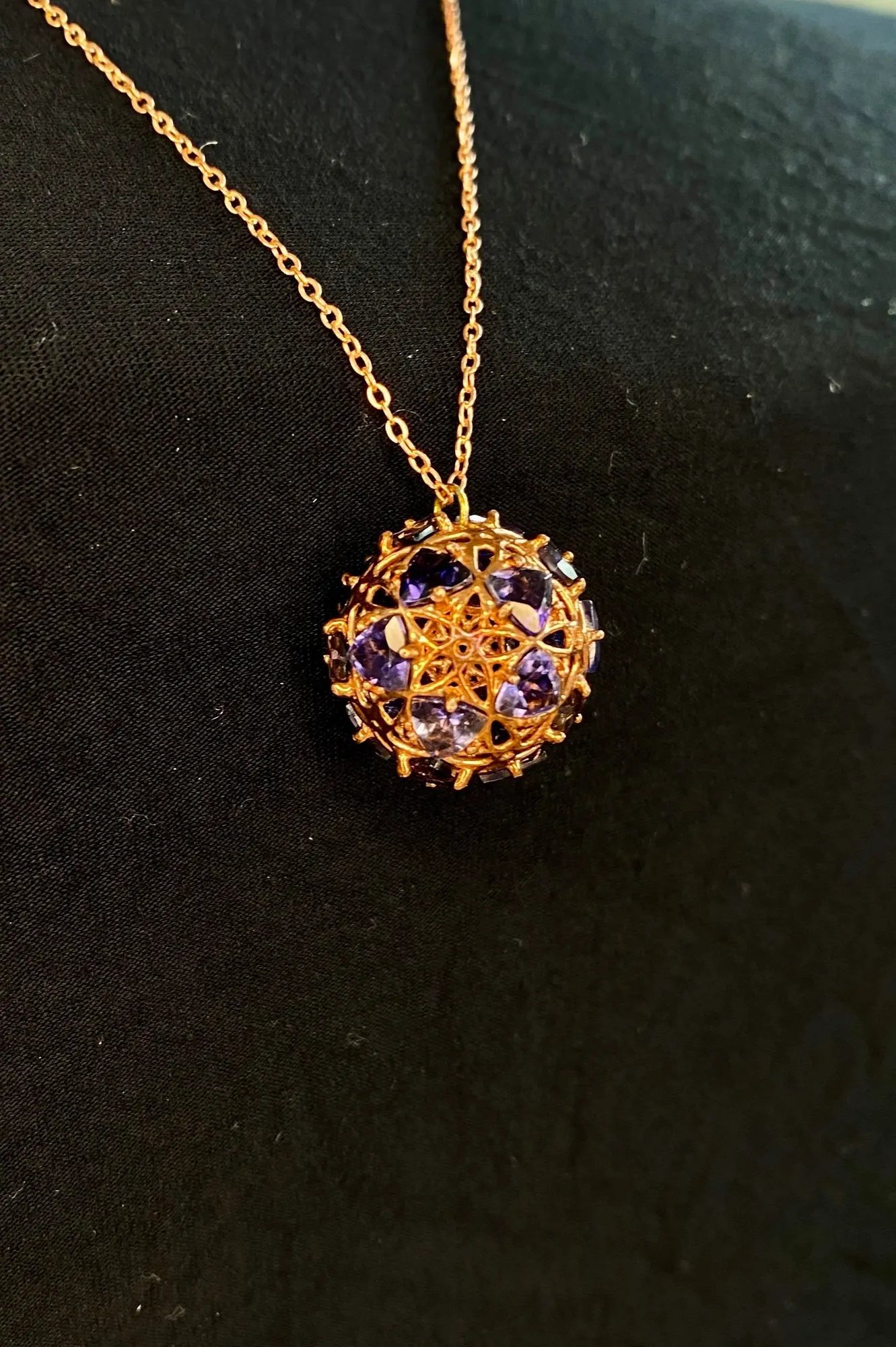 Copper GemSphyr pendant with purple iolite stones, close view