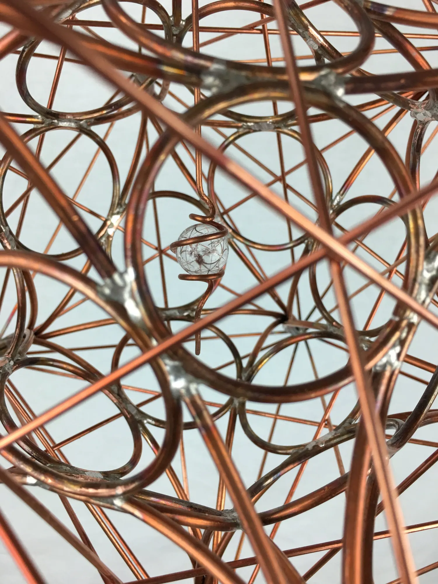 Detail of the soldered copper rings at the center of Metatron's Cube