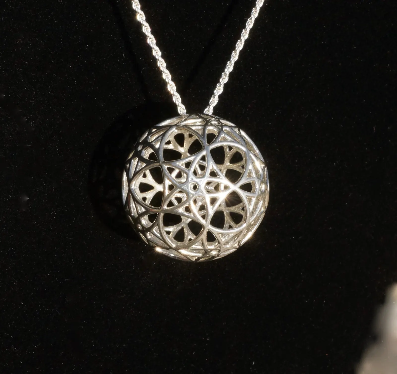 Sterling Silver AllSphyr pendant showing its intersecting circle pattern